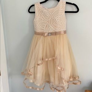Stunning cream colored formal dress for girls.